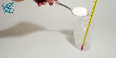 Sciensation hands-on experiment for school: Colder than ice ( chemistry, physics, water, salt, ice, crystals, endothermic, melting)